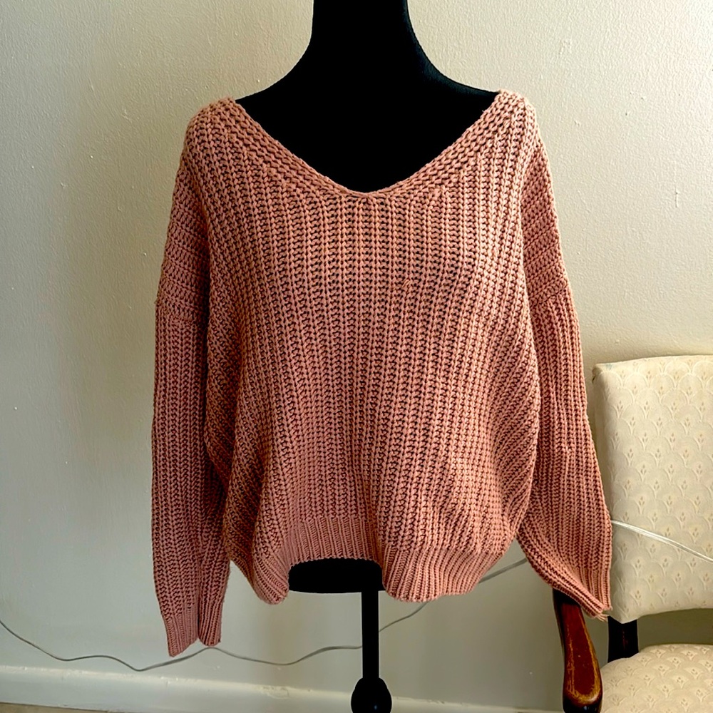 Pink loose fitting sweater with corset back
